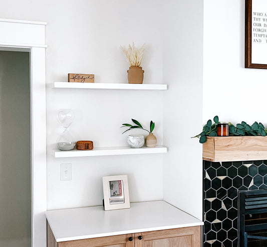 White solid wood floating shelves