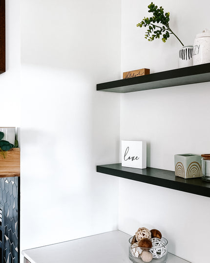 Black solid wood floating shelves