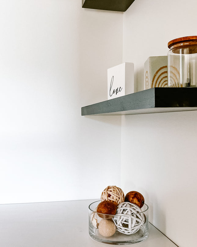Black solid wood floating shelves