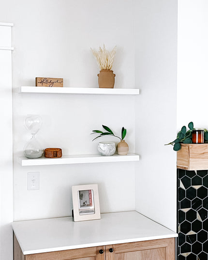White solid wood floating shelves