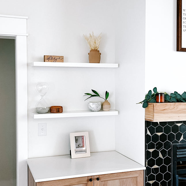 White solid wood floating shelves