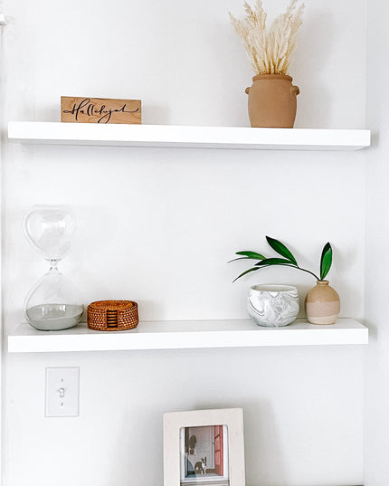 White solid wood floating shelves