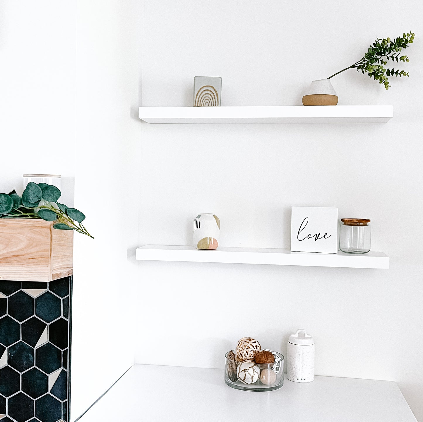 White solid wood floating shelves